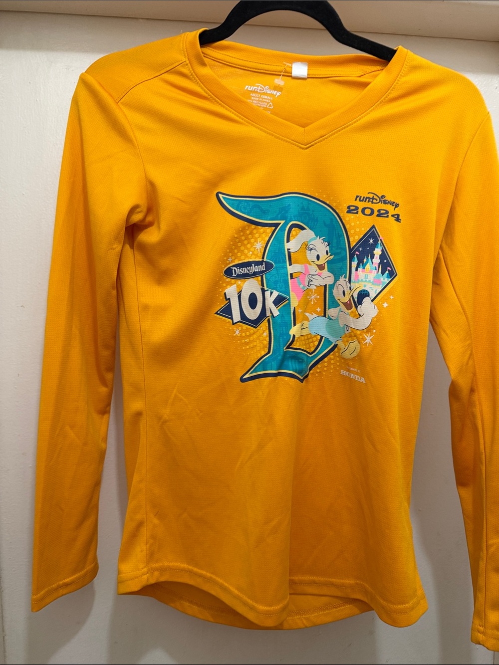 Disney Yellow Long-Sleeve Kids' 10K Race Shirt with Character Graphic